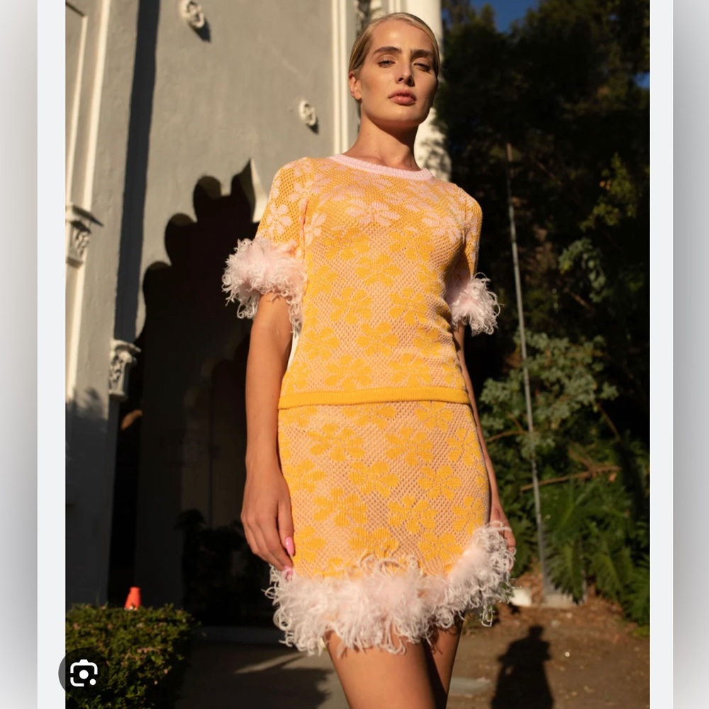 Andreeva knit top with feathers and mini skirt